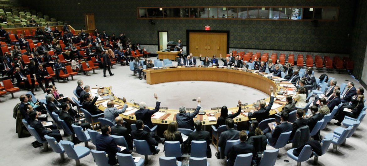 The Security Council unanimously adopts resolution on threats to international peace and security caused by terrorist acts.