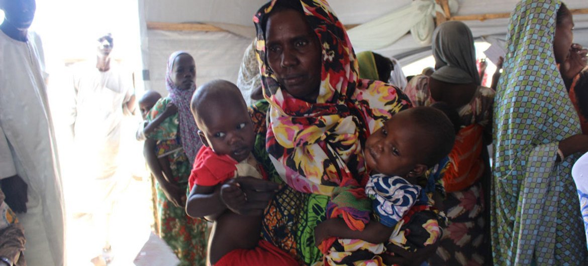 A mother with her children in Monguno, Borno state, northeast Nigeria. (file)