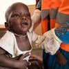 A 7 month old boy is assessed for malnutrition by a UNICEF Nutrition Officer at a UNICEF-supported health clinic at Muna Garage IDP camp, Maiduguri, Borno State, northeast Nigeria.
