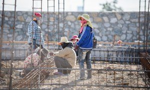 Often overworked and undervalued, women migrants are the backbone of both their host and home communities – sustaining economies through remittances, entrepreneurship and resilience. (file photo)