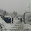 Мигранты  и искатели убежища на греческом острове  Лесбос, порытом снегом. Январь 2017  года. Фото ООН