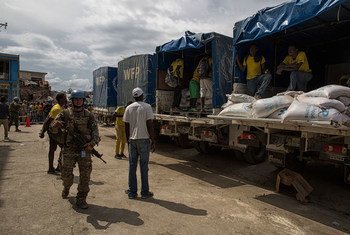 MINUSTAH peacekeepers provide security at a WFP distribution point in Jeremie, Haiti, which was severely impacted by Hurricane Matthew on Tuesday 4 October 2016.