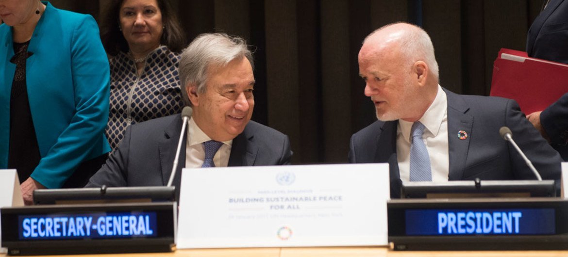 Secretary-General António Guterres (left) with Peter Thomson, President of the General Assembly, at the high-level dialogue on building sustainable peace for all.