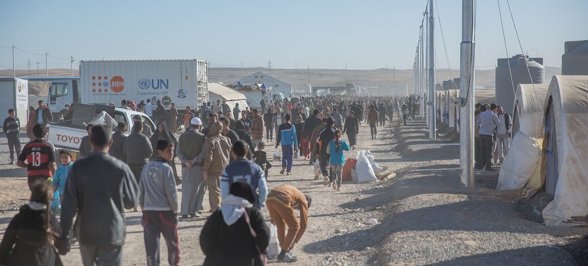 On 21 November, children and families who have just fled Mosul arrive in Khazir Displacement Camp, Ninewa Governorate.