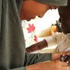 (من الأرشيف) يتم تلقيح طفل خلال حملة ضد الحصبة استهدفت 4.7 مليون طفل في أداماوا وبورنو ويوبي في شمال شرق نيجيريا.