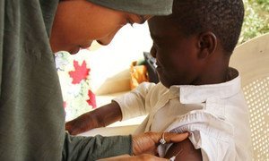 A child is vaccinated during a measles campaign targeting 4.7 million children in Adamawa, Borno and Yobe in northeast Nigeria.