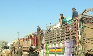 People return from Pakistan to Afghanistan at Torkham Crossing in the Nagarhar Province.