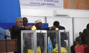 Members of Parliament in Somalia cast their ballots at the Mogadishu Airport hangar during the first round of voting in the presidential election. 8 February 2017.