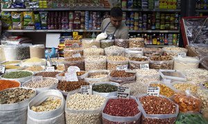 Pulses and dried fuits on sale at the Esquilino market in Rome, Italy.