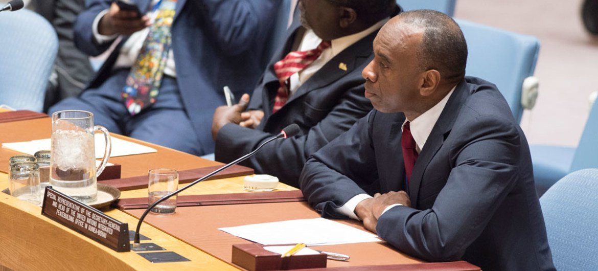 Special Representative and head of the UN Integrated Peacebuilding Office in Guinea-Bissau (UNIOGBIS), Modibo Touré (right), briefs the Security Council.