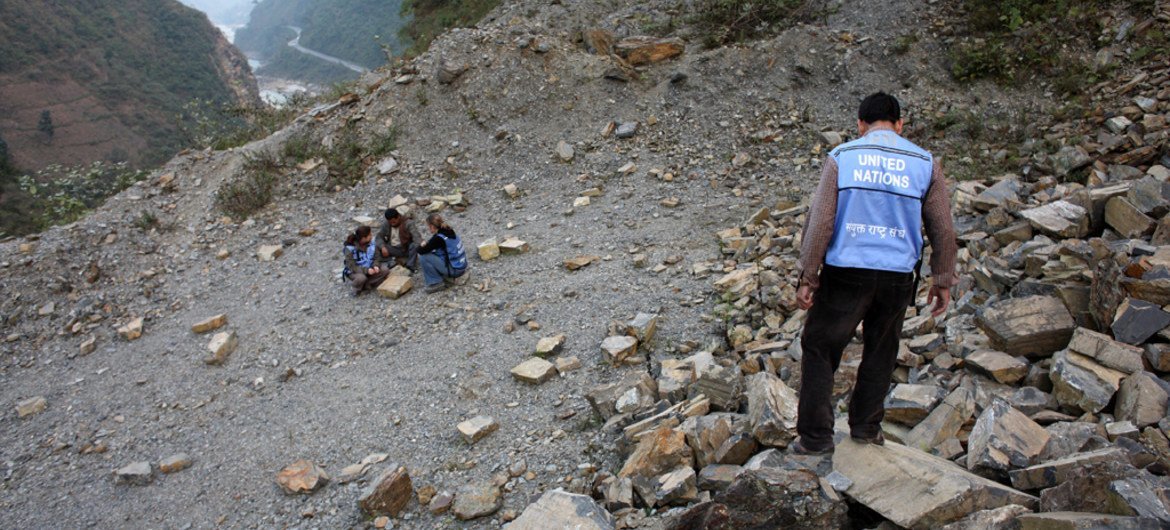 OHCHR human rights officers speaking with a member of the Chepang indigenous community in Nepal. (file)