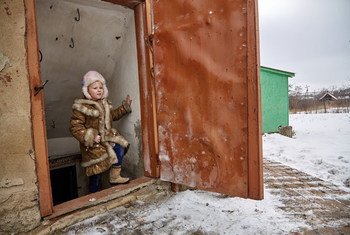On 13 February 2017, when there seemed to be a pause in the shelling and fighting, Sasha, 6, carefully ascends the steep steps that lead outside of the cellar of her home, about 15 kilometres from the contact line in Toretsk, Donetsk Region, Ukraine.