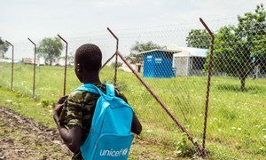 A 15-year-old boy, former child soldier on his way to school in a South Sudan town. (file)