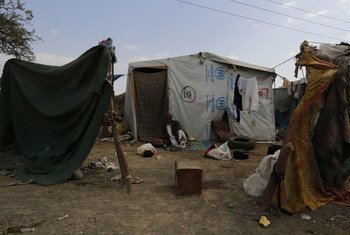 A man from the city of Sa'ada, sits outside his tent in the Dharwan settlement outside Yemen’s capital Sana’a. He fled with his eight sons to the temporary settlement after his house was destroyed by Yemen’s devastating conflict.
