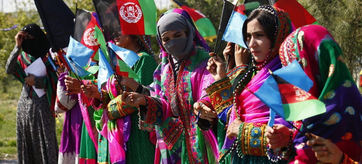 International Women’s Day is being celebrated in Laghman City, where women gather in traditional colours and costumes. Photo UNAMA/Fardin Waezi