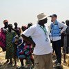Emergency Relief Coordinator Stephen O'Brien (second right) visiting Ganyiel, Unity state, South Sudan, on 4 March 2017, is briefed on the ongoing humanitarian response to famine in the region.