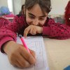 On 16 January 2017, a girl in a Turkish language class in Nizip 1 refugee camp, Gaziantep, southern Turkey. Nizip 1 camp is home to over 10,000 Syrian refugees, including more than 5,000 children.