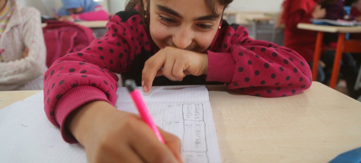 On 16 January 2017, a girl in a Turkish language class in Nizip 1 refugee camp, Gaziantep, southern Turkey. Nizip 1 camp is home to over 10,000 Syrian refugees, including more than 5,000 children.