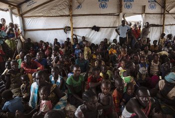 South Sudanese refugees wait to be registered at the Imvepi Reception Centre, Arua District, Northern Region, Uganda.