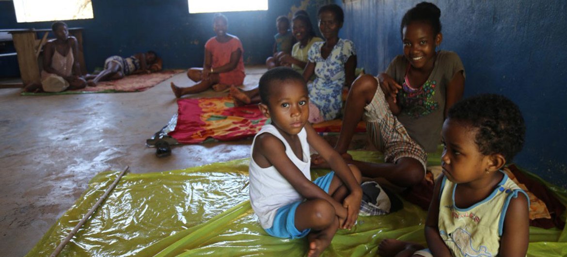 Women and children displaced by cyclone Enawo shelter in a classroom in the Sava region of Madagascar.