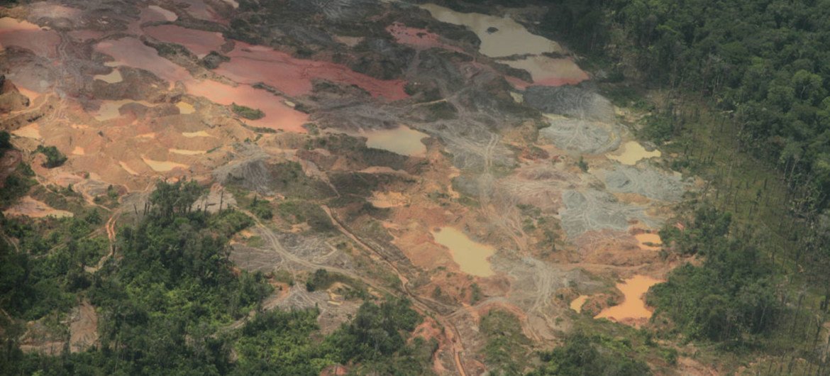 Extensive environmental damage from illegal mining on the Quito River, Chocó region, Colombia.