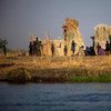 Una famila en Terekeka, Sudán del Sur. Foto: FAO/ Albert González Farran