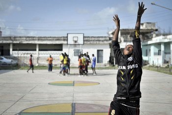 A girl takes a shot during a basketball training session in Mogadishu, Somalia.