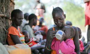 A two-year old child is fed an infusion of neem tree leaves in Rumbek, South Sudan.