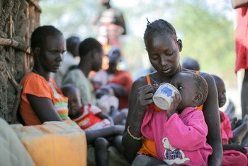 A two-year old child is fed an infusion of neem tree leaves in Rumbek, South Sudan.
