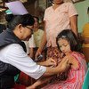 A child being vaccinated in a vaccination post established in Hlaing Thar Yar Township, Yangon, Myanmar