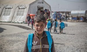 A boy inside the Qayyarah Jad’ah displacement camp, Mosul, Iraq.