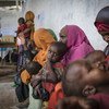 Mothers and children wait to be screened for malnutrition at a UNICEF-supported Outpatient Therapeutic Program in Baidoa, Somalia. UNICEF/Mackenzie Knowles-Coursin
