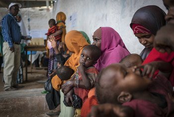 Mothers and children wait to be screened for malnutrition at a UNICEF-supported Outpatient Therapeutic Program in Baidoa, Somalia. UNICEF/Mackenzie Knowles-Coursin