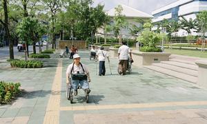 A park in Bangkok, Thailand, where accessibility and assistive features such as detectable guides and warnings have been installed. 