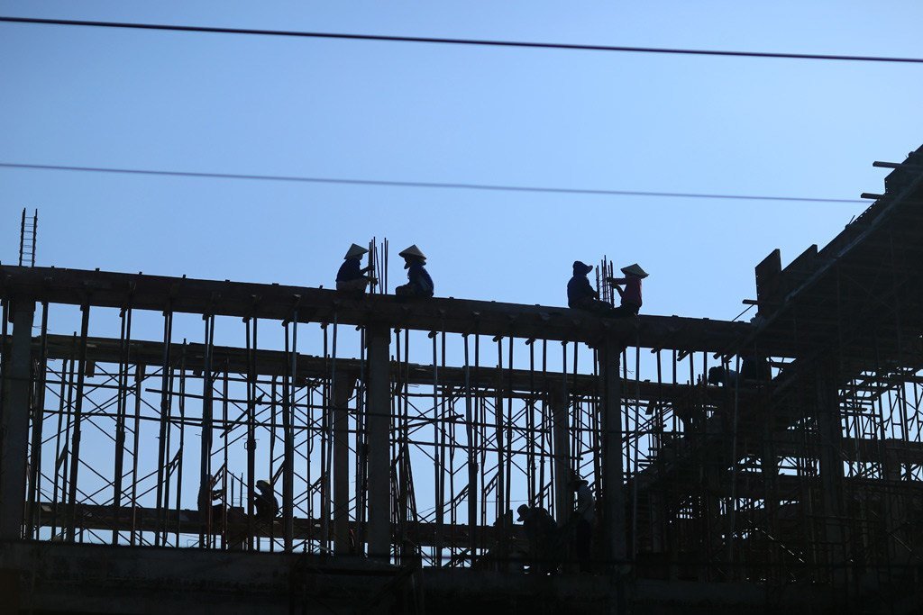Workers at a construction site in Binh Thuan province, Viet Nam.