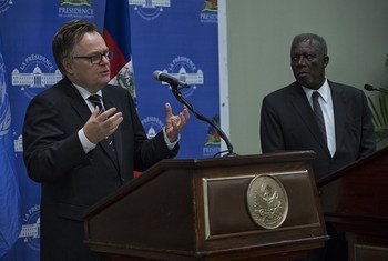 The Chair of the UN Economic and Social Council (ECOSOC) Ad Hoc Advisory Group for Haiti, Marc-André Blanchard (L), and Haitian Prime Minister Dr. Jack Guy Lafontant speak to the press at the Haitian National palace during the Group’s three day mission to Haiti.