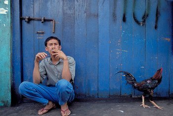 Man smoking in Indonesia.