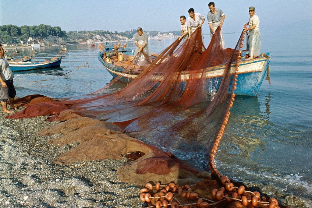 Fishermen at work in Evia, Greece (January 1973).