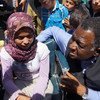 UNFPA Executive Director, Dr. Babatunde Osotimehin, with a Syrian teenage girl with special needs at the Nizip Camp in Turkey.