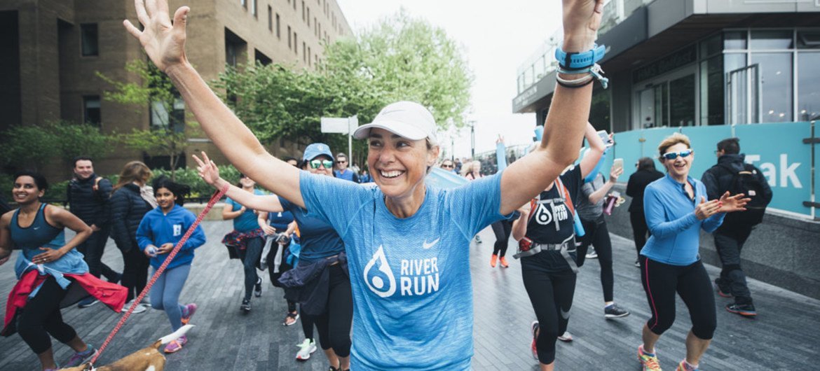 In the United Kingdom, Mina Guli runs to the finish of the 6 River Run on 30 April 2017.