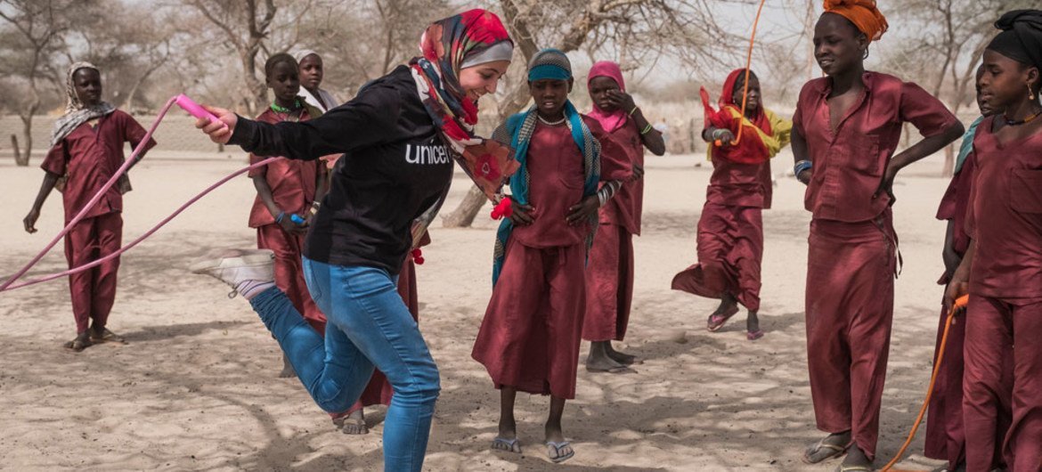 UNICEF Goodwill Ambassador Muzoon Almellehan skips rope with students at the School of Peace at a internally displaced peoples site in the Lake Region, Chad. She visited the conflict-affected region in April 2017. UNICEF/Sokhin
