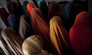 Women stand in a shelter for girls and women who have endured sexual and gender-based violence, in Mogadishu, Somalia. The shelter is run by the Elman Peace and Human Rights Centre with UNICEF support.