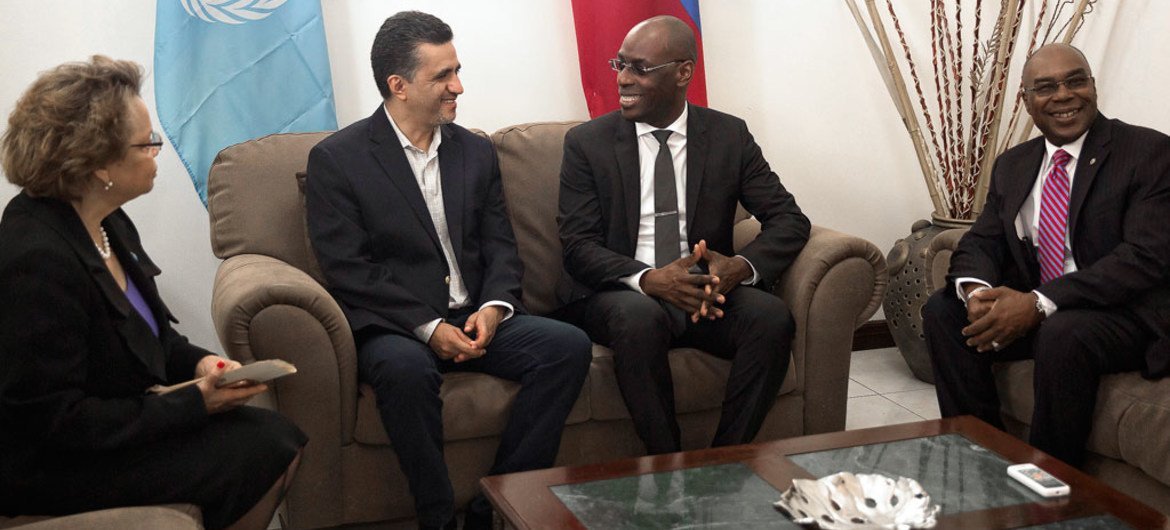 Ambassador Sacha Sergio Llorentty Solíz (centre left) of Bolivia  and President of the Security Council for June, with PresidentJovenel Moise (centre right) of Haiti, during a three-day visit of a Security Council delegation to Haiti.