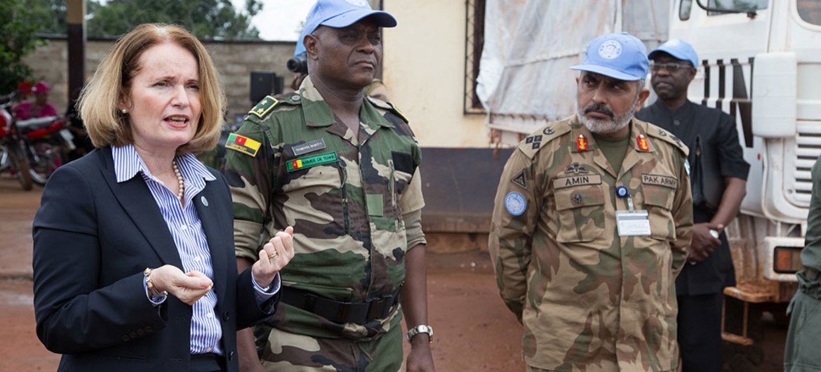 Diane Corner, pictured in 2014, while visiting the town of Kaga Bandoro together with the mission's Force Commander General Martin Chomu Tumenta and the Commander for the Central Sector, General Mohamed Amin.