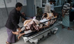 A suspected cholera patient is rushed into Al Joumhouri Hospital in Sana’a, Yemen.