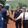 Chief of the Standing Police Capacity, Maria Appelblom, is greeted by Police Officers during a visit to MINUSCA in Bangui, Central African Republic.