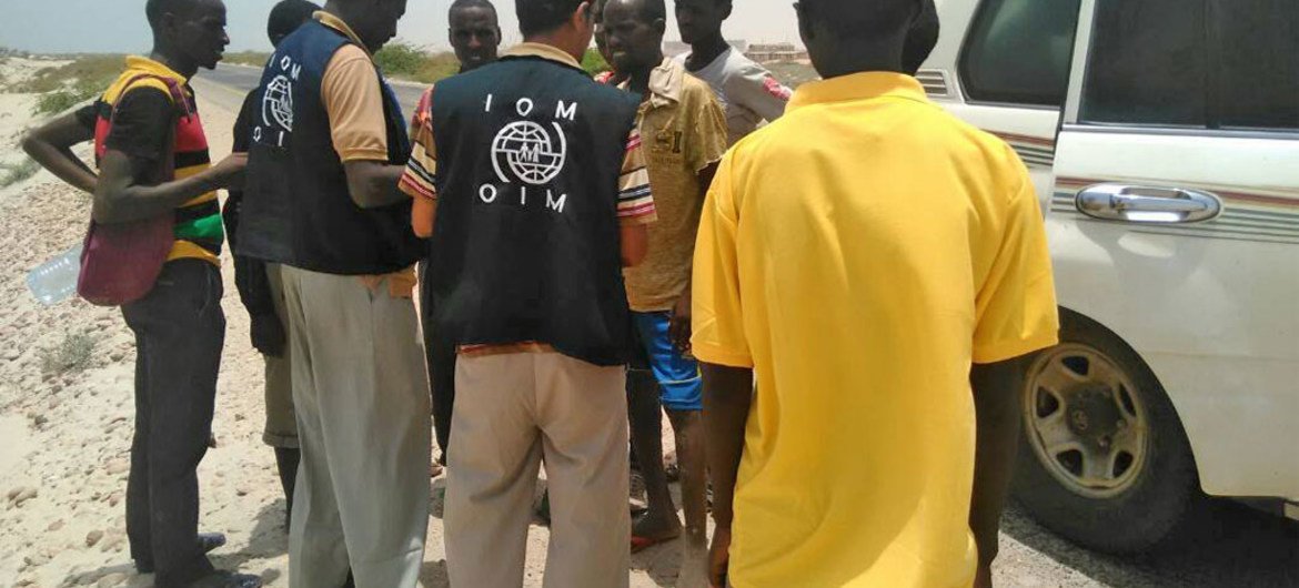 IOM staff assist Somali, Ethiopian migrants who were forced into the sea by smugglers.