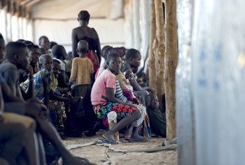 The Imvepi refugee camp in the Arua district, northern Uganda. Seen here are refugees waiting for additional profiling. They will then wait to be relocated to different zones within the camp.
