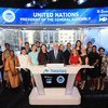 Peter Thomson, President of the 71st Session of the United Nations General Assembly (at podium), rings the Nasdaq Opening Bell.