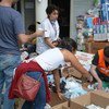 Voluntarios reparten ayuda en México. Foto: CINU México